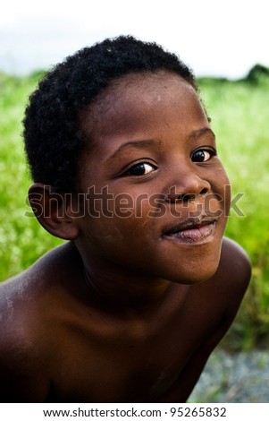 MANZINI, SWAZILAND-DEC 27: Portrait of unidentified Swazi boy on Dec 27, 2007 in a small village near Manzini, Swaziland.  Close to 10% of Swaziland’s total population are orphans, due to HIV/AIDS.