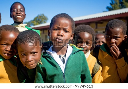 MALOLOTJA, SWAZILAND-JULY 31: Unidentified orphan schoolboys on July 31, 2008 in Malolotja Government School, Malolotja, Swaziland. Close to 10% of Swazilands population are orphans, due to HIV/AIDS.