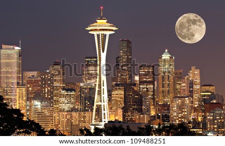 The lights come on in Seattle with a full moon