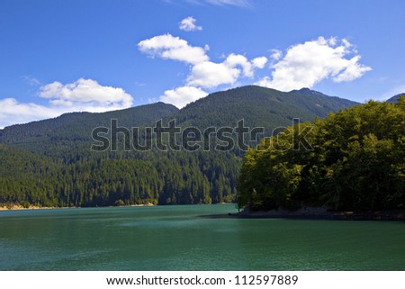 Baker Lake\'s emerald waters is located in the North Cascades national Park just East of Mt Baker, Washington State.