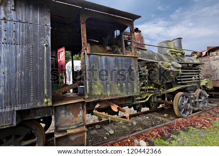 An old rusting vintage steam locomotive