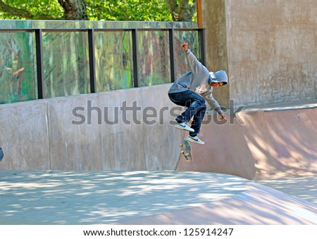 SEATTLE-JULY 21: A skateboarder at the Seattle Center Skatepark in Seattle WA on July 21, 2012. The Skatepark features a surface area of 10,000 square feet with state-of-the-art skating elements.
