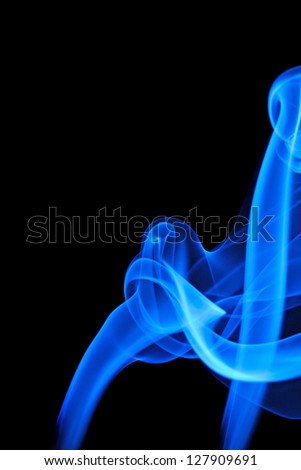 Swirling smoke patterns forming an artistic background