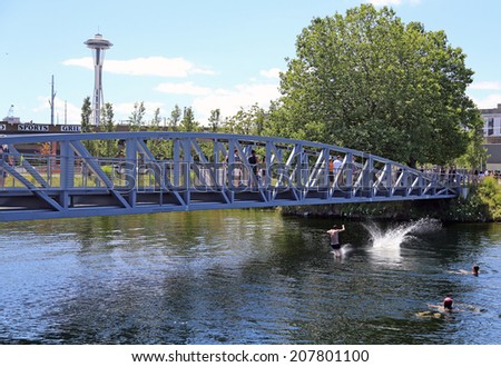 Seattle - July 6: Seattleites enjoying the hot summer weather and cooling off in lake union. July 6, 2014 Lake Union Park, Seattle, Washington