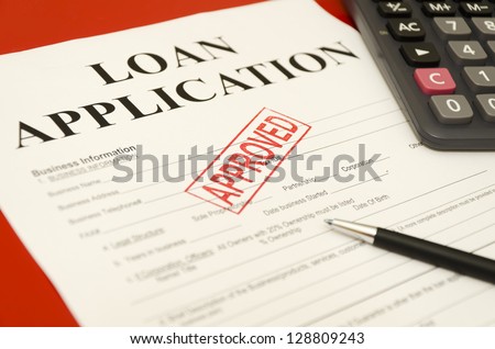 Stamp printed on the approved loan application approved.
