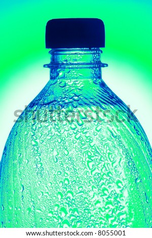 Mineral water on a green background
