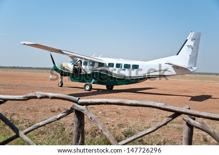 parked airplane in the national park masai mara in kenya