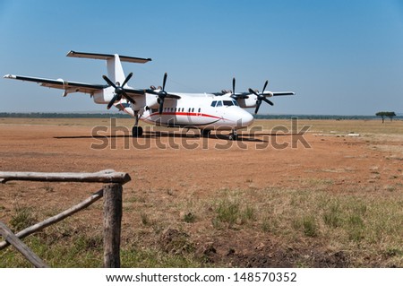 parked airplane in the national park masai mara in kenya