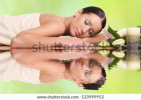 young healthy girl relaxing in spa young healthy girl relaxing in spa