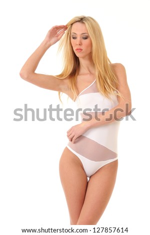 beautiful girl with a good figure in a white bikini