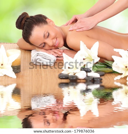 Beautiful woman enjoying a massage therapy