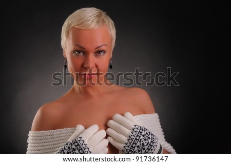 sports a beautiful woman on a black background with a scarf