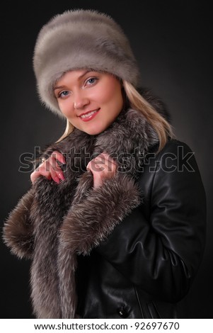 woman in fur hat and fur coat