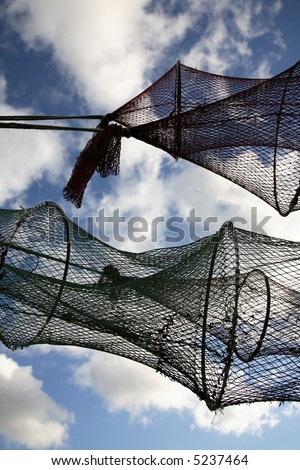 Drying fish trap nets on drying ground