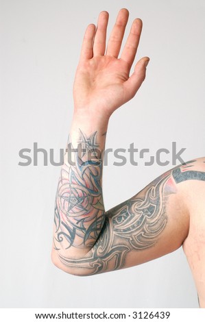 stock photo Tattoo on arm grey background