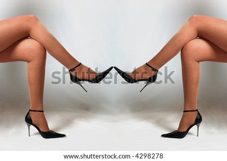 stock photo girls legs on grey background