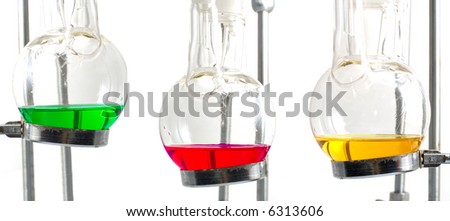 three chemistry experiment red, green, yellow, isolated on white background