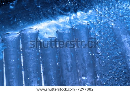 water drops and chemistry glass in laboratory