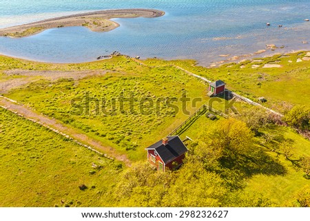 KARLSKRONA, SWEDEN - MAY 22, 2015: Typical small red Swedish house on the south end of the island of Oland, Sweden
