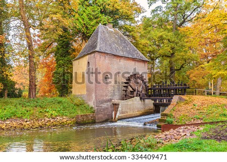 Old water mill in the Dutch province of Gelderland during autumn