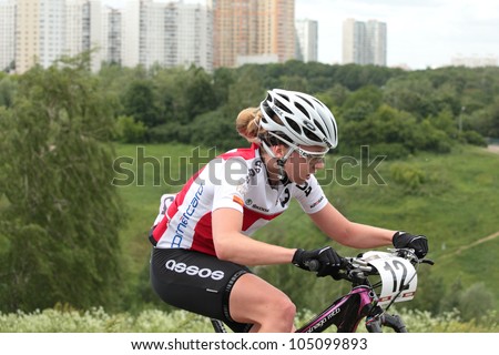 MOSCOW, RUSSIA - JUNE 9: Vivienne Meyer (Switzerland) races during the European Mountain Bike Cross-Country Championship in Moscow, Russia at June 9, 2012
