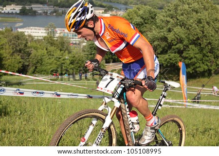 MOSCOW, RUSSIA - JUNE 9: Michiel van der Heijden (Netherlands) in the European Mountain Bike Cross-Country Championship in Moscow, Russia at June 9, 2012