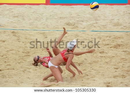 MOSCOW, RUSSIA - JUNE 8: Kolocova-Slukova, Czech Republic vs E. Ukolova (further) - E. Khomyakova (closer), Russia, during Beach Volleyball Swatch World Tour in Moscow, Russia at June 8, 2012