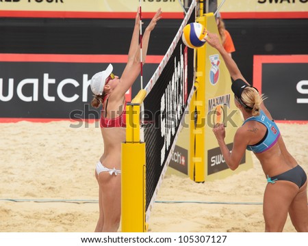 MOSCOW, RUSSIA - JUNE 8: K. Kolocova - M. Slukova (right), Czech Republic vs E. Ukolova - E. Khomyakova (left), Russia, during Beach Volleyball Swatch World Tour in Moscow, Russia at June 8, 2012