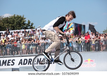 MOSCOW, RUSSIA - JULY 8: Denis Stepanov in BMX competitions during Adrenalin Games in Moscow, Russia at July 8, 2012