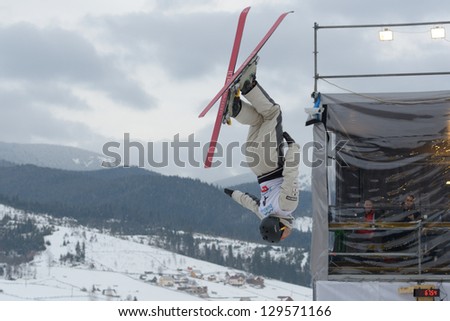 BUKOVEL, UKRAINE - FEBRUARY 23: David Morris, Australia performs aerial skiing during Freestyle Ski World Cup in Bukovel, Ukraine on February 23, 2013.
