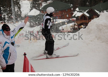 BUKOVEL, UKRAINE - FEBRUARY 23: Naoya Tabara, Japan performs speed check during Freestyle Ski World Cup in Bukovel, Ukraine on February 23, 2013.