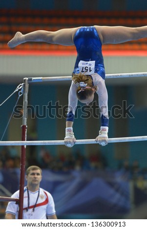MOSCOW, RUSSIA - APRIL 20: Maria Paseka, Russia performs exercise on uneven bars in final of 5th European Championships in Artistic Gymnastics in Moscow, Russia on April 20, 2013