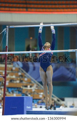 MOSCOW, RUSSIA - APRIL 20: Rebecca Downie, Great Britain performs exercise on uneven bars in final of 5th European Championships in Artistic Gymnastics in Moscow, Russia on April 20, 2013
