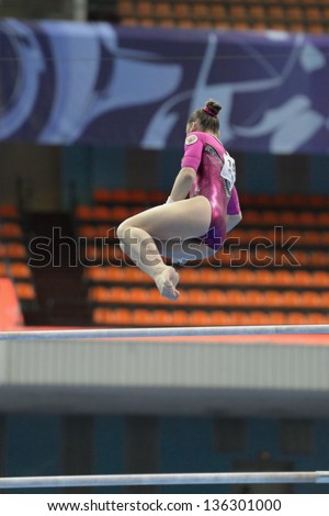 MOSCOW, RUSSIA - APRIL 20: Aliya Mustafina, Russia performs exercise on uneven bars in final of 5th European Championships in Artistic Gymnastics in Moscow, Russia on April 20, 2013