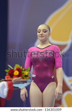 MOSCOW, RUSSIA - APRIL 20: Aliya Mustafina, Russia win the gold medal on uneven bars during 5th European Championships in Artistic Gymnastics in Moscow, Russia on April 20, 2013