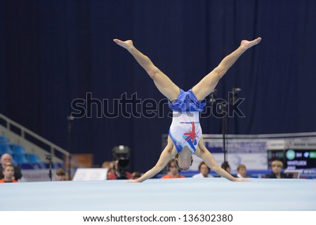 MOSCOW, RUSSIA - APRIL 20: Max Whitlock, Great Britain performs the floor exercise in the final of 5th European Championships in Artistic Gymnastics in Moscow, Russia on April 20, 2013