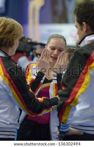 MOSCOW, RUSSIA - APRIL 20: Sophie Scheder, Germany cries after the exercise on uneven bars in final of 5th European Championships in Artistic Gymnastics in Moscow, Russia on April 20, 2013