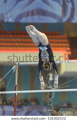 MOSCOW, RUSSIA - APRIL 20: Ruby Harrold, Great Britain performs exercise on uneven bars in final of 5th European Championships in Artistic Gymnastics in Moscow, Russia on April 20, 2013