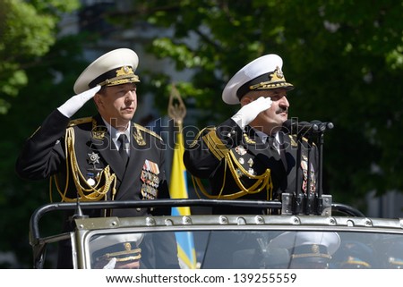SEVASTOPOL, UKRAINE - MAY 9: Vice admirals Fedotenkov, Russia, left and Ilyin, Ukraine review the troops during military parade in honor of Victory Day in Sevastopol, Crimea, Ukraine on May 9, 2013