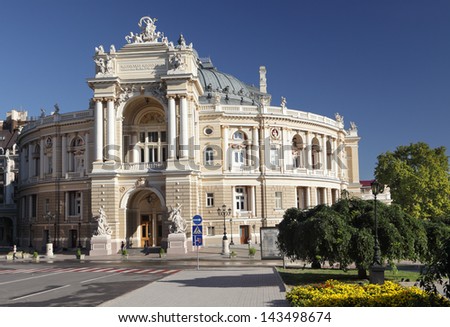 ODESSA, UKRAINE - SEPTEMBER 23: People walks under the building of Opera theater in Odessa, Ukraine on September 23, 2010. Forbes noted this theater as one of most unusual landmarks in Eastern Europe