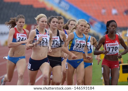 DONETSK, UKRAINE - JULY 11: Girls compete in the heat on 800 meters during 8th IAAF World Youth Championships in Donetsk, Ukraine on July 11, 2013