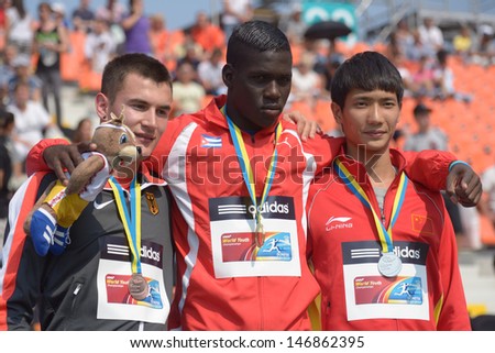 DONETSK, UKRAINE - JULY 14: Medalists in triple jump on medal ceremony during 8th IAAF World Youth Championships in Donetsk, Ukraine on July 14, 2013