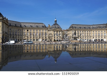BORDEAUX, FRANCE - JUNE 27: Place de la Bourse reflected in the water mirror in Bordeaux, France on June 27, 2013. Opened in 2006, the pool is the largest water mirror in the world with 3450 sq. m.