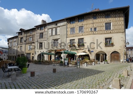 LIMOGES, FRANCE - SEPTEMBER 10, 2013: Almost empty street restaurants on Rue Haute Cite in Limoges. Located near the Limoges Cathedral, this place attracts a lot of tourists in evening