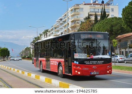 ANTALYA, TURKEY - MARCH 26, 2014: Public bus Antobus, from Antalya bus, on the line. Public transport in Antalya used by 38 percents of habitans