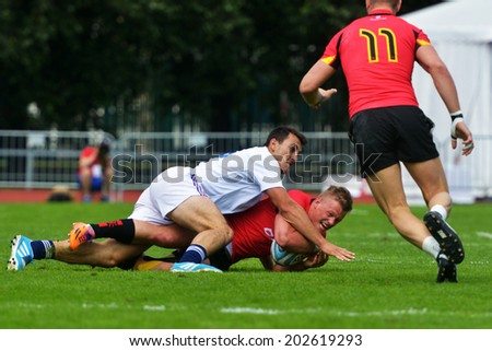 MOSCOW, RUSSIA - JUNE 29, 2014: Match for place 7 between France (white uniform) and Belgium during the FIRA-AER European Grand Prix Series. Belgium won 43-0