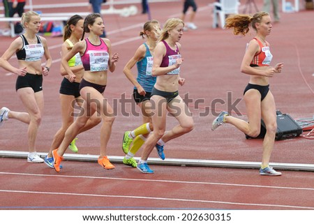 ZHUKOVSKY, MOSCOW REGION, RUSSIA - JUNE 27, 2014: Female athletes in the women 5000 meters during Znamensky Memorial. The competitions is one of the European Athletics Outdoor Classic Meetings