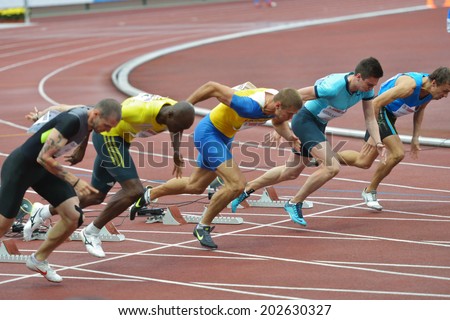 ZHUKOVSKY, MOSCOW REGION, RUSSIA - JUNE 27, 2014: Start of men 100 meters during Znamensky Memorial. The competitions is one of the European Athletics Outdoor Classic Meetings