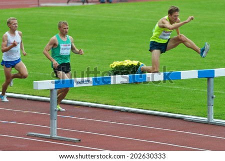ZHUKOVSKY, MOSCOW REGION, RUSSIA - JUNE 27, 2014: Start of men 2000 meters during Znamensky Memorial. The competitions is one of the European Athletics Outdoor Classic Meetings