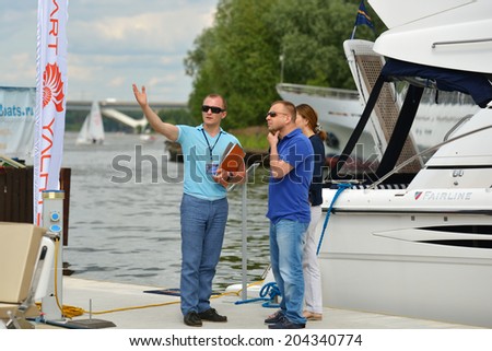 DOLGOPRUDNY, MOSCOW REGION, RUSSIA - JULY 4, 2014: People on the 5th Yachts and Boats Fair 